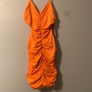 Orange Ruffled dress with side holes